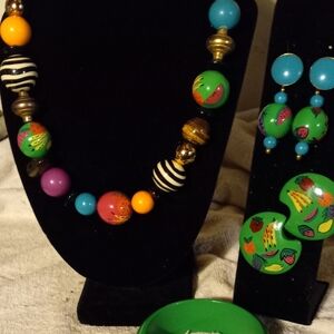 Not new,one tag, vintage, colorful hand painted fruit bead plastic 4pc jewerly.
